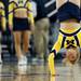A Michigan cheerleader does acrobatic tricks during a timeout on Monday. Daniel Brenner I AnnArbor.com